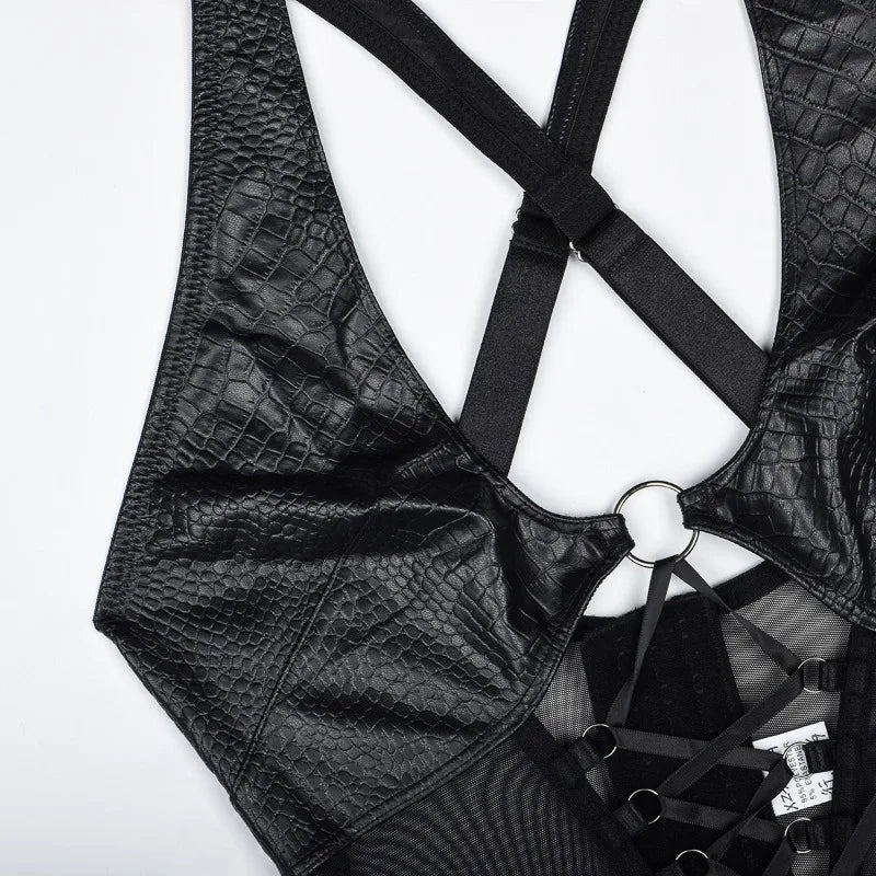 Black leather harness on a white background