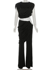 Black draped outfit on a mannequin with 'WeirdPuss' branding.