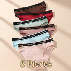 Set of women's underwear with 'HOTCOM' branding on a beige background