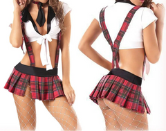 Woman wearing a red plaid skirt and suspenders with a white top on a white background