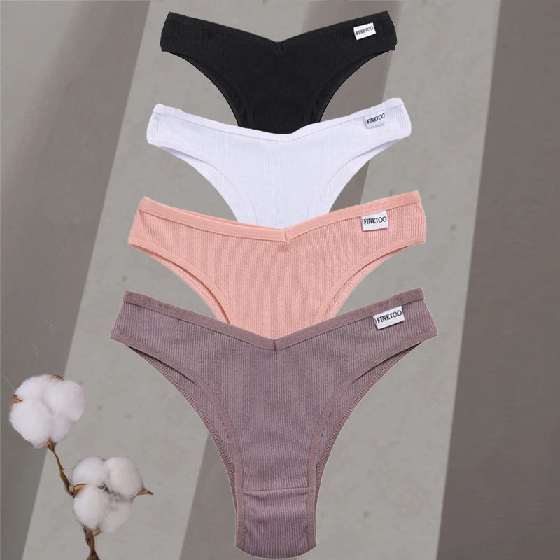 Four pairs of underwear in black, white, pink, and purple on a gray background with cotton branches.