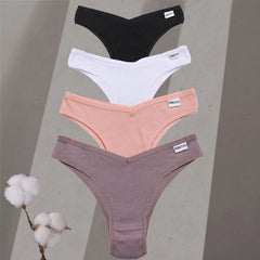 Four pairs of underwear in black, white, pink, and purple on a gray background with cotton branches.
