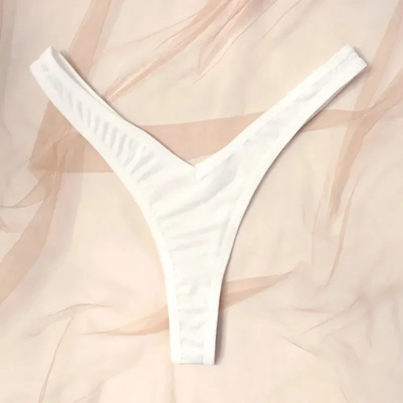 White thong on a soft beige background
