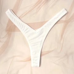 White thong on a soft beige background