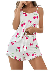 White sleeveless top and shorts set with cherry and bow pattern on a white background