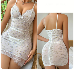 White lace nightgown with floral patterns on a neutral background