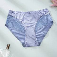 Lavender underwear with lace details on a white background
