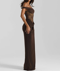Woman wearing a brown off-shoulder evening gown on a white background