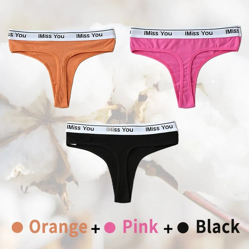 Three pairs of men's underwear in orange, pink, and black with 'I Miss You' waistband on a white background.
