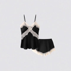 Black lace lingerie set on a light gray background