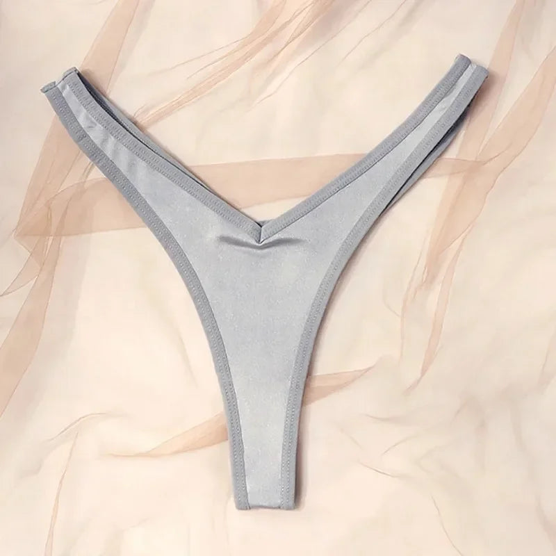 Gray thong on a soft beige background