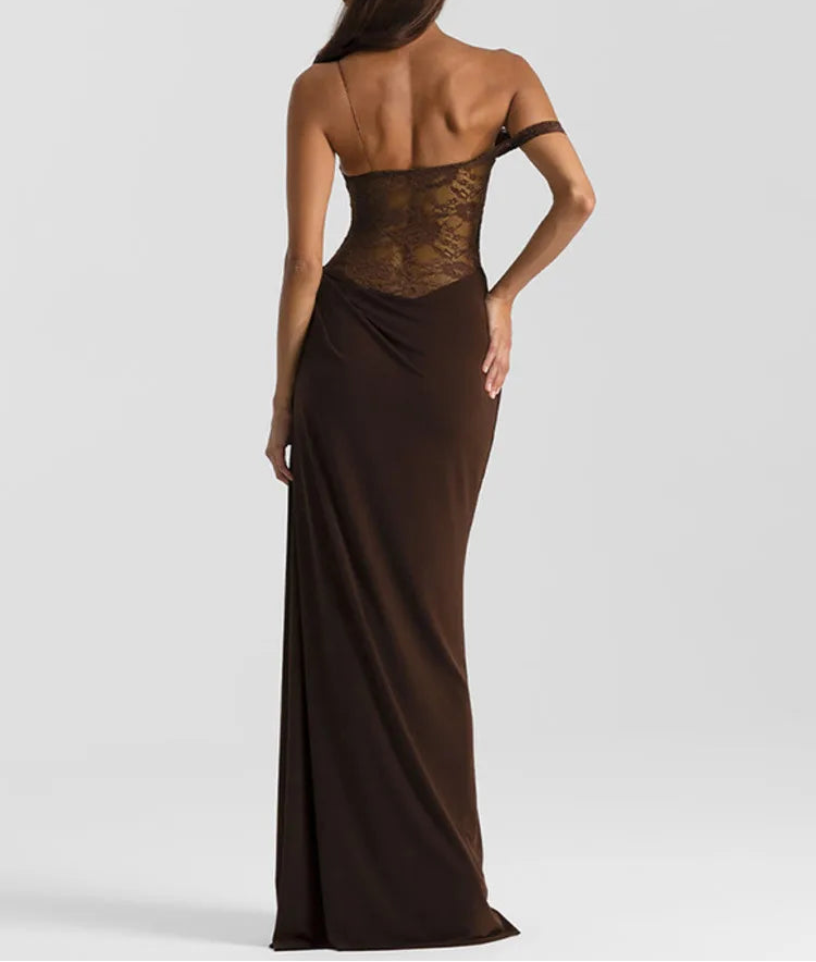 Woman wearing a brown evening gown with lace detailing on a white background