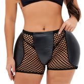 Black fishnet shorts with leather accents worn by a person on a white background