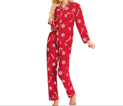 Woman wearing red pajamas with white patterns on a white background