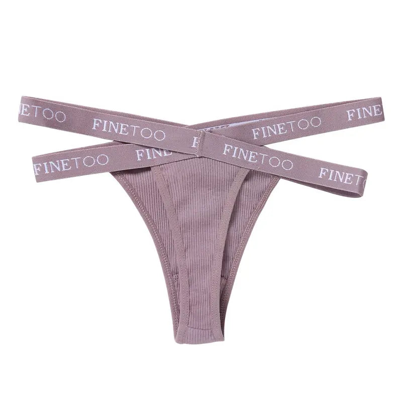 Purple ribbed thong with 'FINETOOL' waistbands on a white background