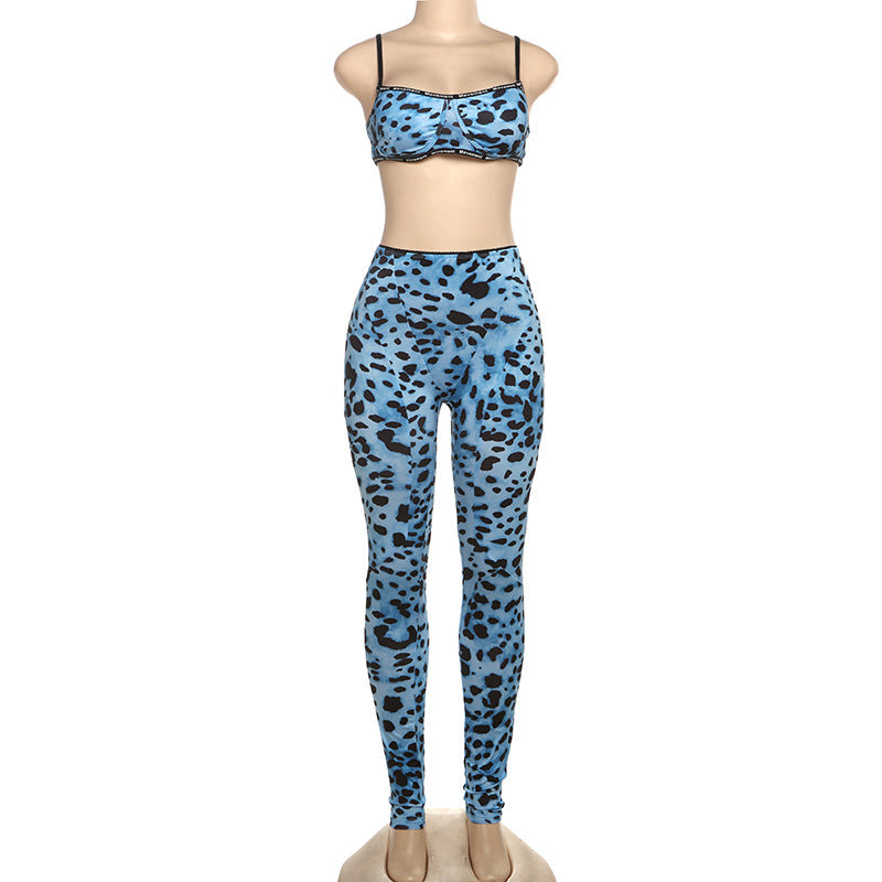 Blue leopard print top and leggings set on a mannequin against a white background
