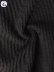 Close-up of black ribbed fabric with a label indicating 7 pieces.