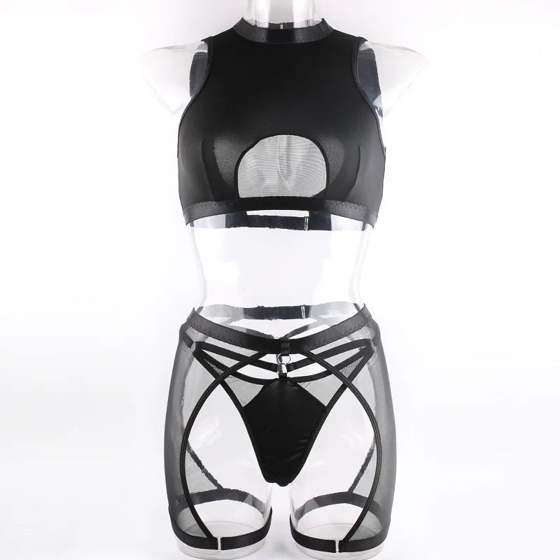 Black mesh top and shorts set on a mannequin against a white background