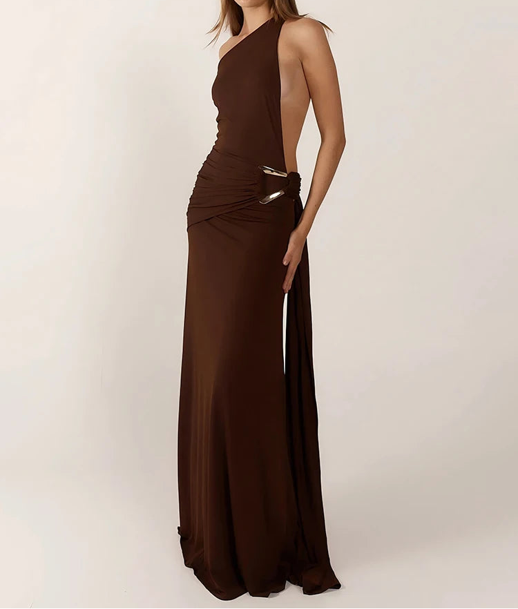 Woman wearing a brown one-shoulder dress on a white background