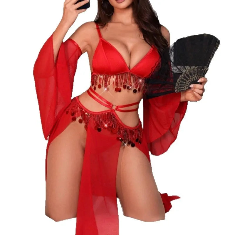 Woman wearing a red lingerie set with fringe details on a white background