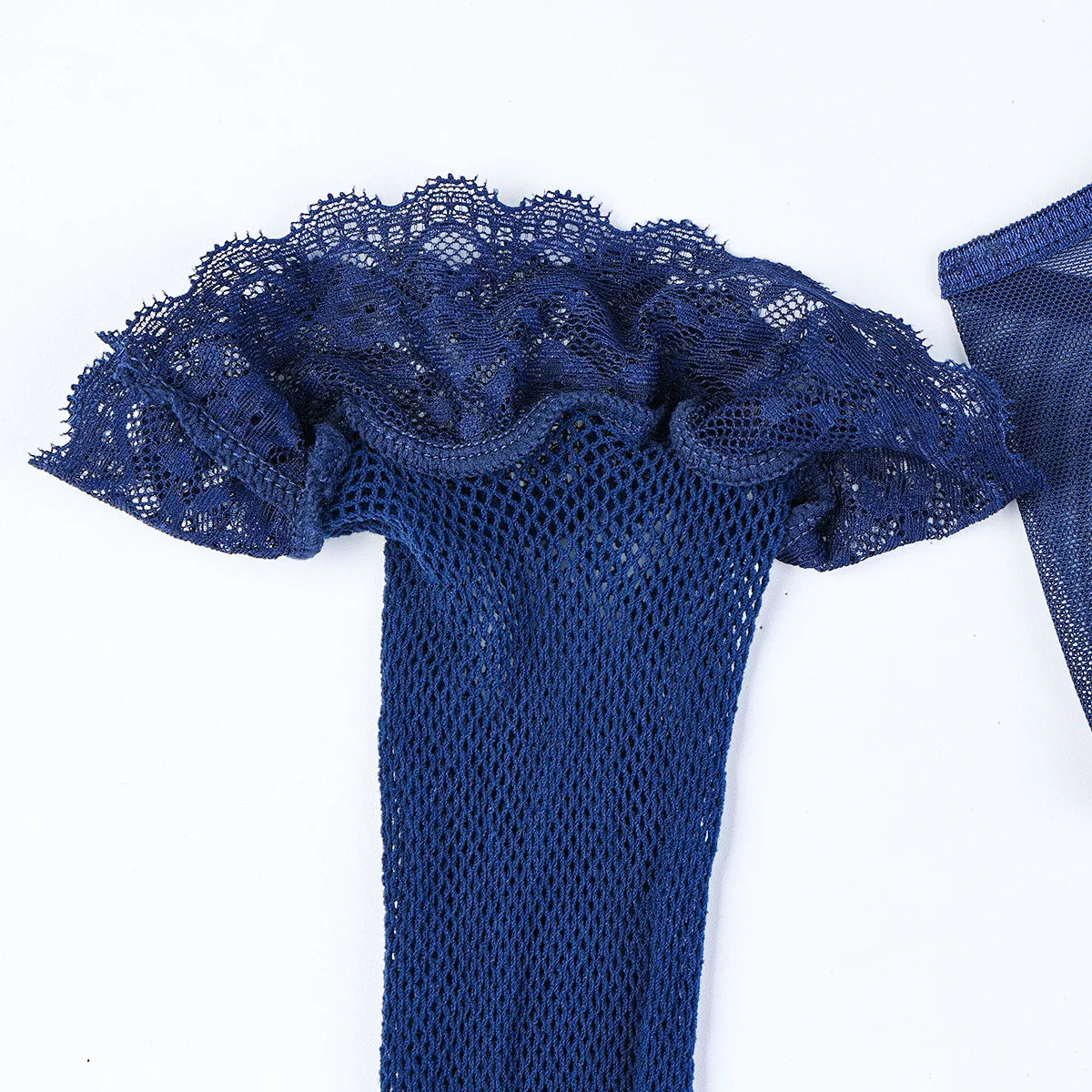 Blue lace top on a white background