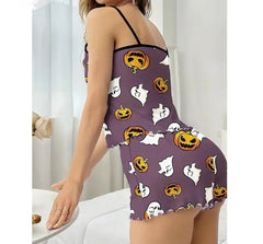 Purple nightgown with Halloween patterns on a white background