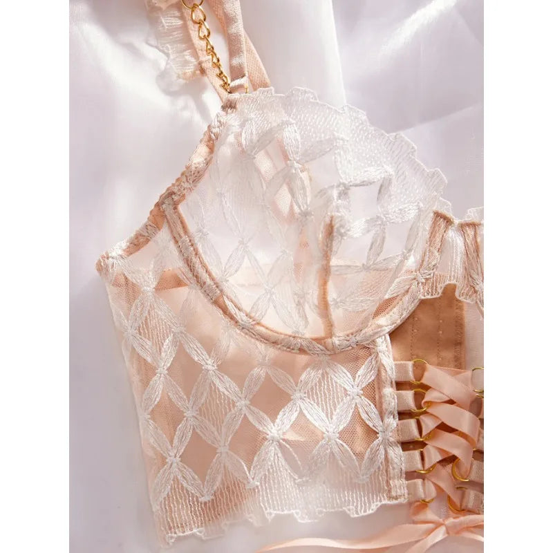 Delicate lace handbag with a gold chain on a white background