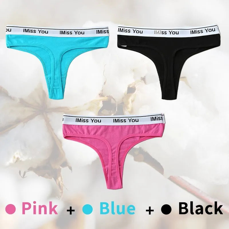 Three pairs of underwear in pink, blue, and black with 'I Miss You' waistbands on a light background.