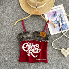 Red tank top with denim bottom and 'Casual Elegance' text on a hanger with accessories.
