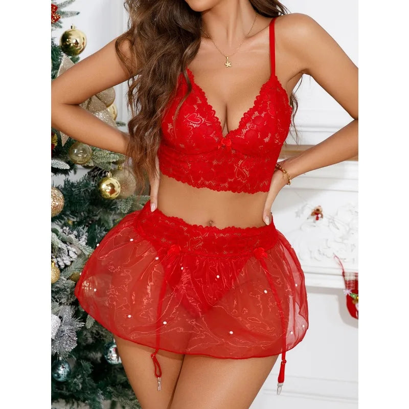 Red lace lingerie set with a Christmas tree in the background