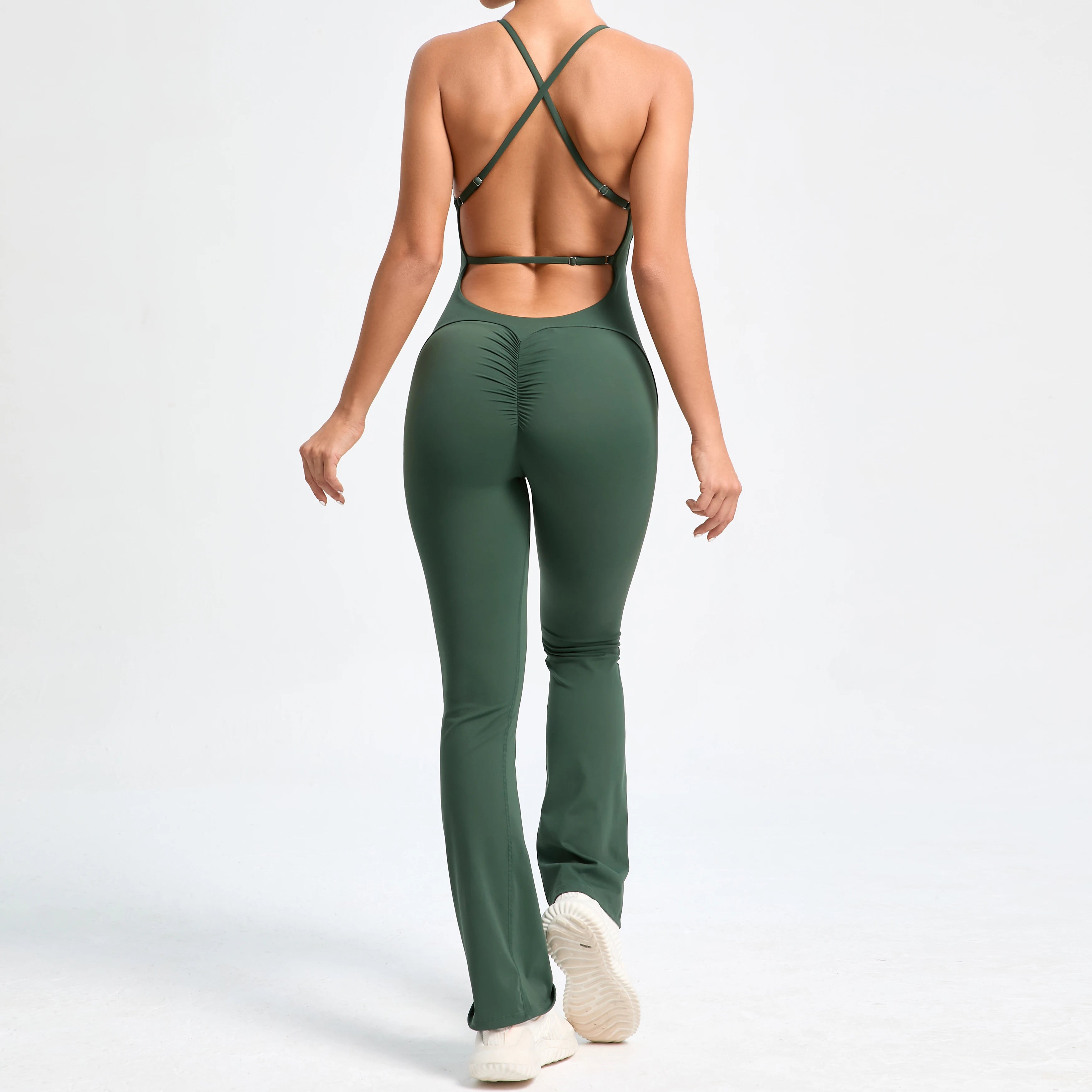 Person wearing a green athletic outfit on a white background
