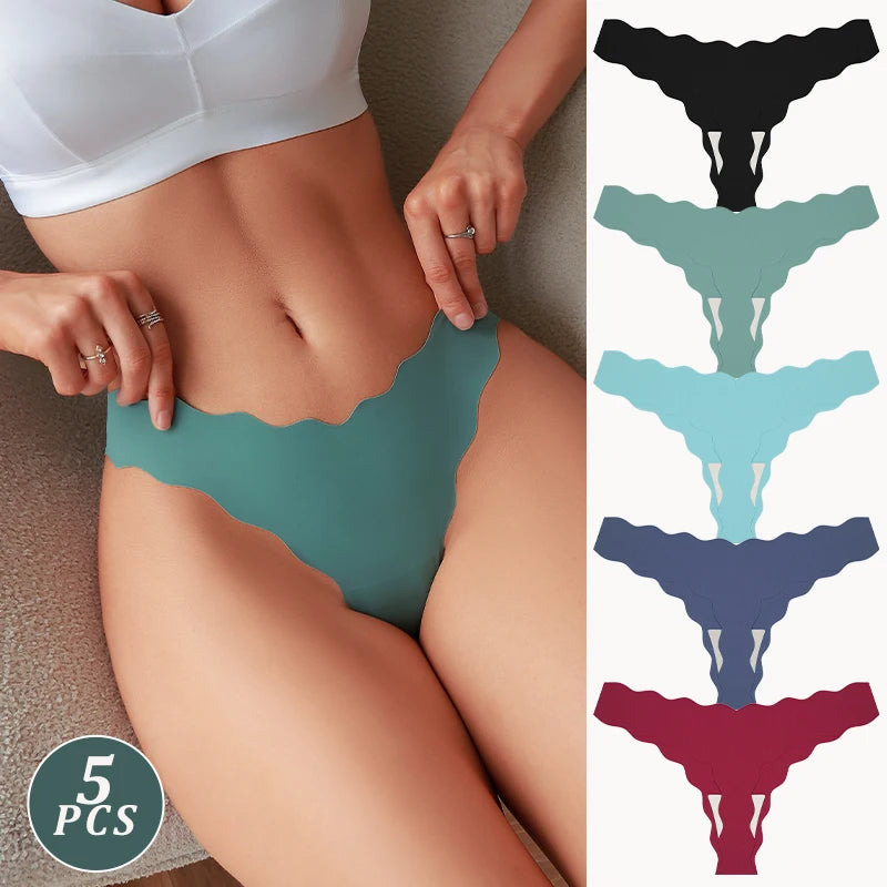 Person wearing teal underwear with color swatches on a neutral background
