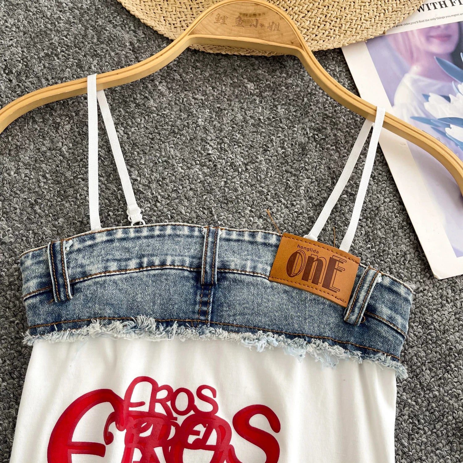 Denim top with 'oneF' label on a hanger against a gray background