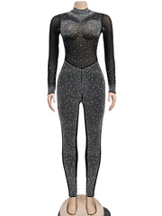 Black and silver rhinestone bodysuit on a mannequin against a white background