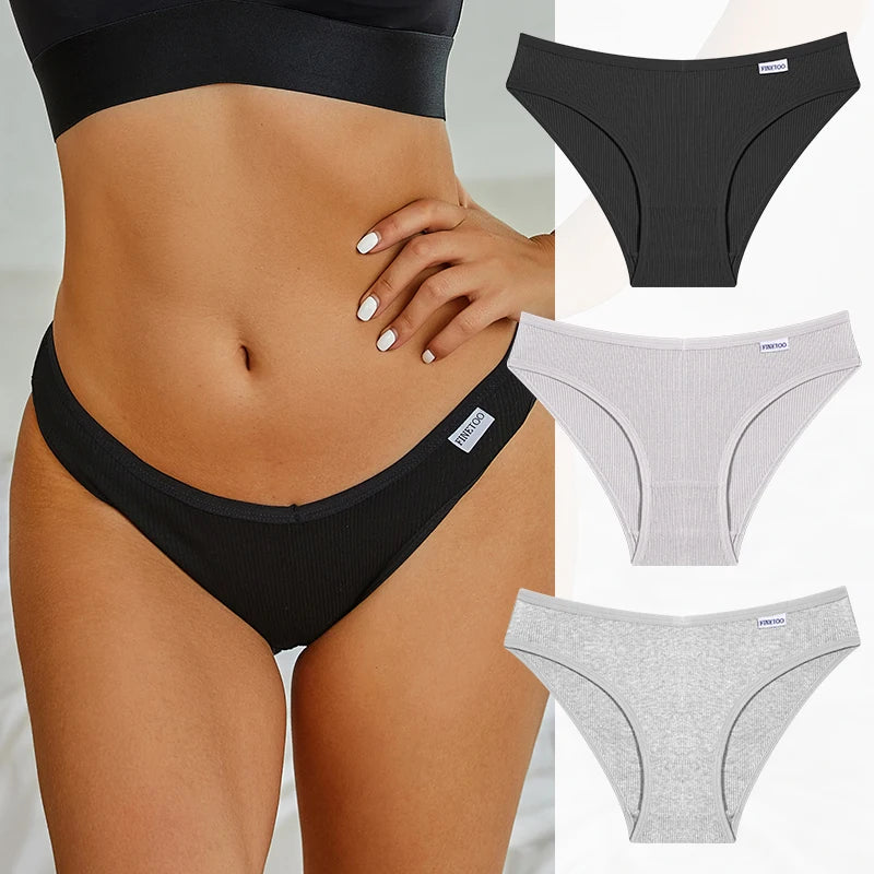 Black and gray women's underwear with a person wearing black underwear.