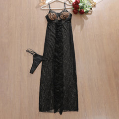 Black lace nightgown with leopard print bralette on a wooden surface.