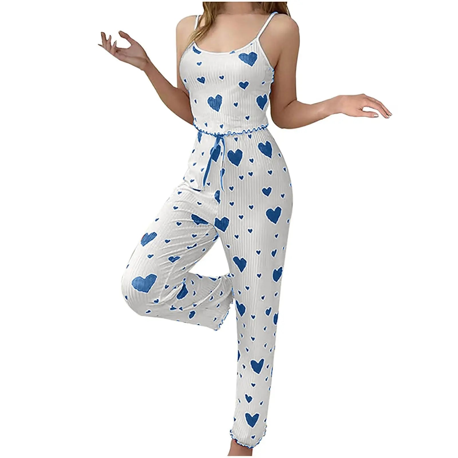 White romper with blue heart patterns on a white background