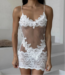 White lace lingerie set with 'TOUCHEART' branding on a neutral background