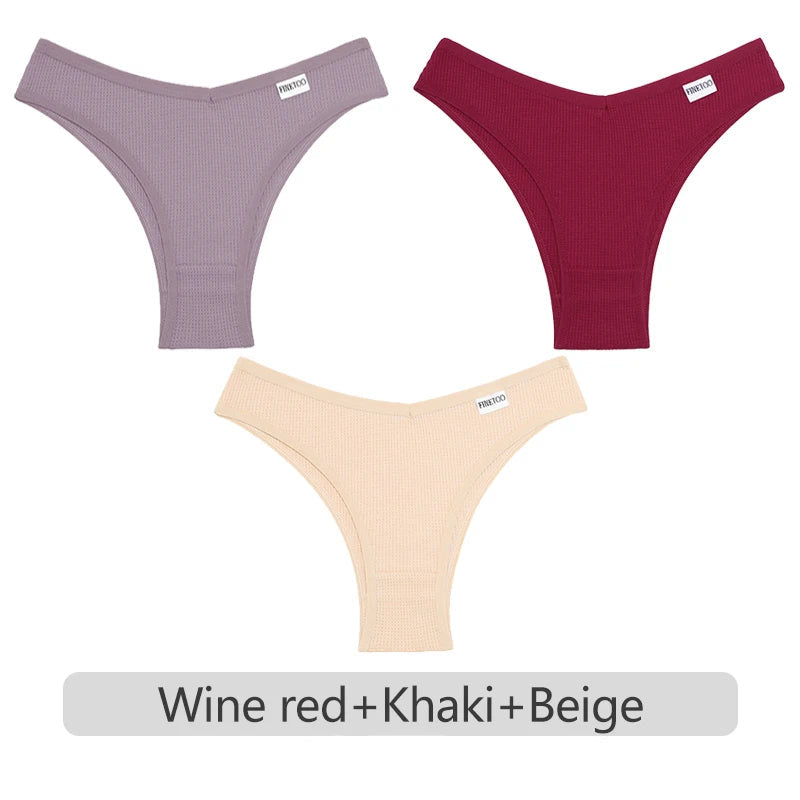 Three pairs of ribbed thongs in wine red, khaki, and beige on a white background.