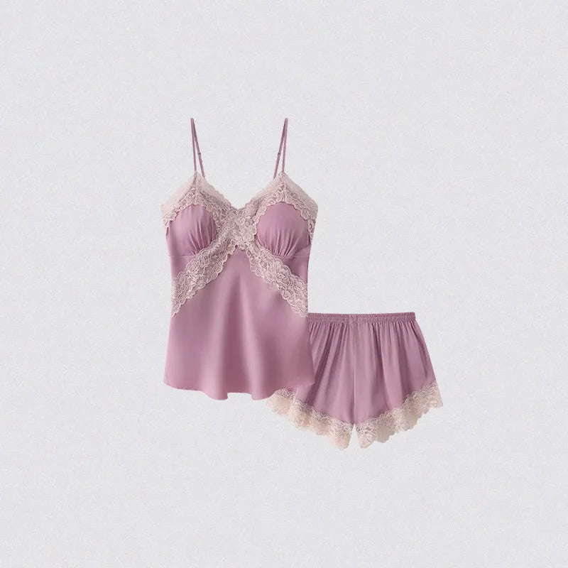 Pink lace lingerie set on a light gray background