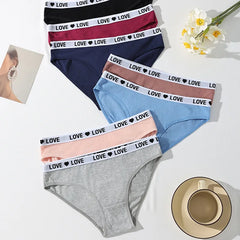 Set of women's underwear with 'LOVE' waistbands on a light surface.
LOVE Waistband Cotton Brief 7-Pack