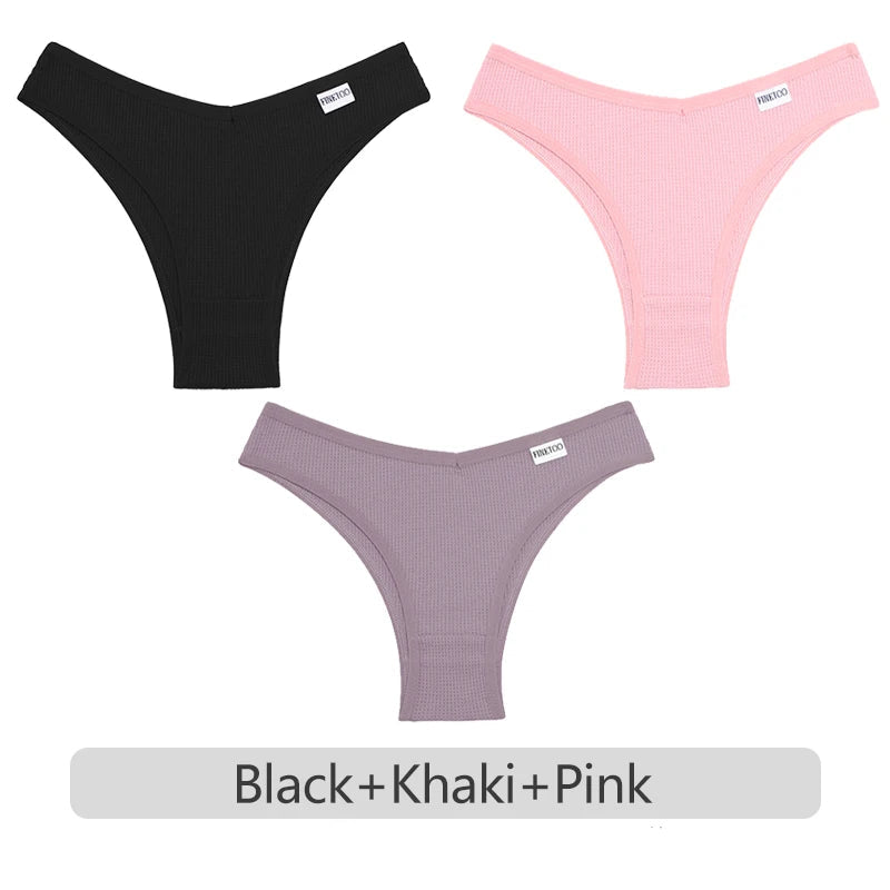 Three pairs of underwear in black, pink, and purple on a white background.