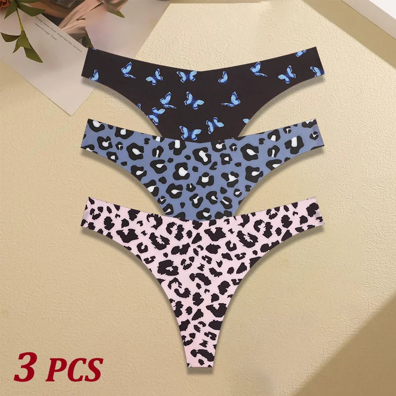 Three pairs of patterned panties on a beige surface with '3 PCS' text.
