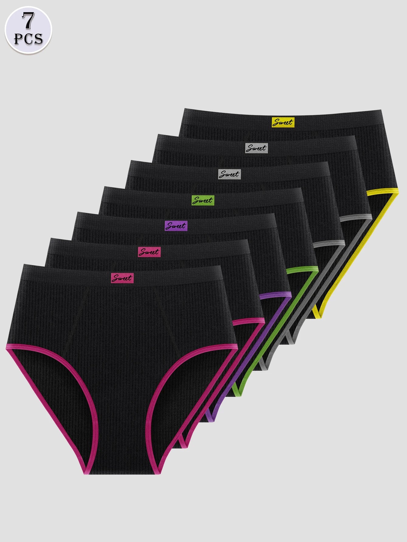 Set of seven black women's underwear with colorful accents on a light gray background