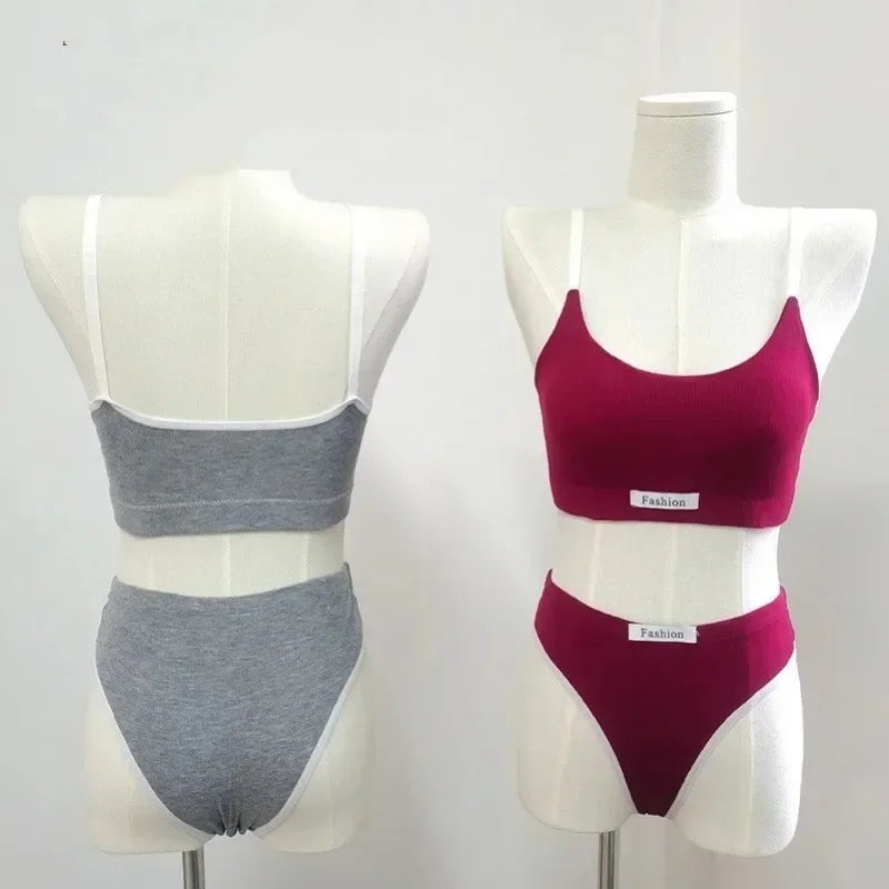 Two sets of women's underwear on mannequins against a white background