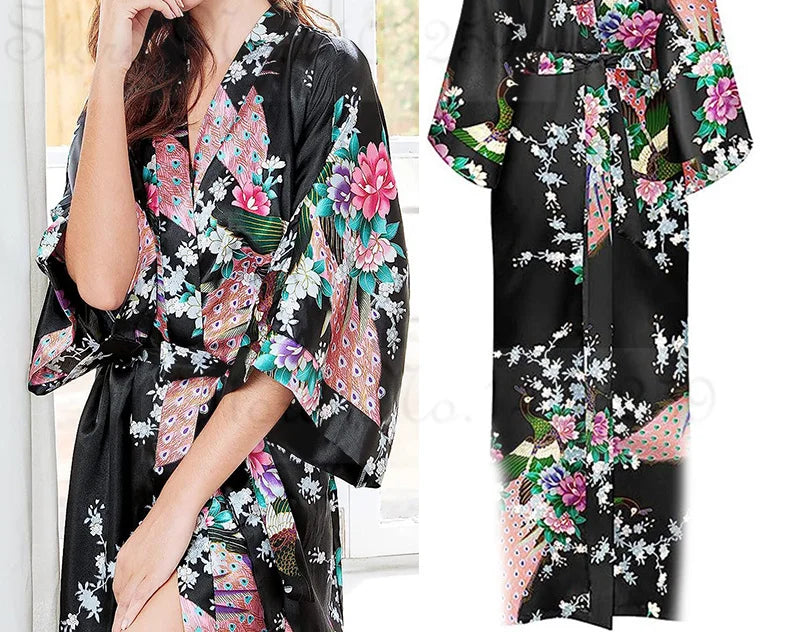 Woman wearing a black floral kimono with a close-up of the garment on a white background.