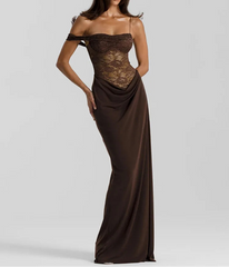 Woman wearing a brown off-shoulder evening gown on a white background