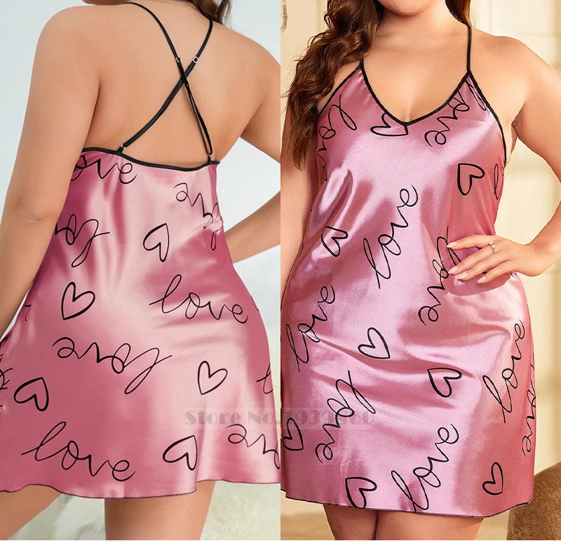 Pink satin nightgown with 'love' and heart patterns worn by a model.