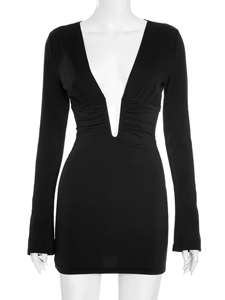 Black dress with long sleeves on a mannequin against a white background