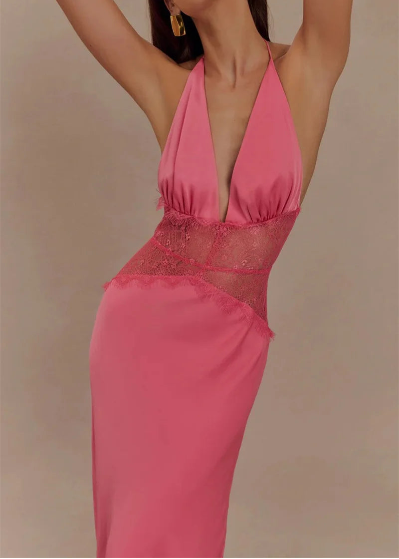 Pink dress with sheer overlay on a beige background